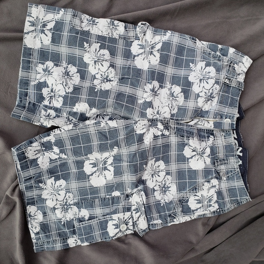Blue cargo shorts with white Hawaiian flowers